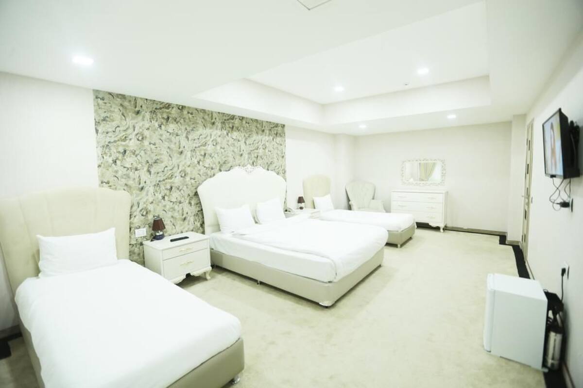 Standard Triple Room | In-room safe, desk, blackout drapes, soundproofing