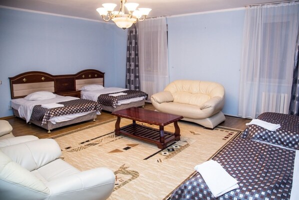 Quadruple Room, Multiple Beds, City View | 1 bedroom, desk, iron/ironing board, free WiFi