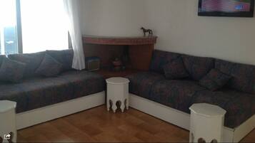 Family Villa, 3 Bedrooms, Sea View | Living area | Flat-screen TV, ping pong