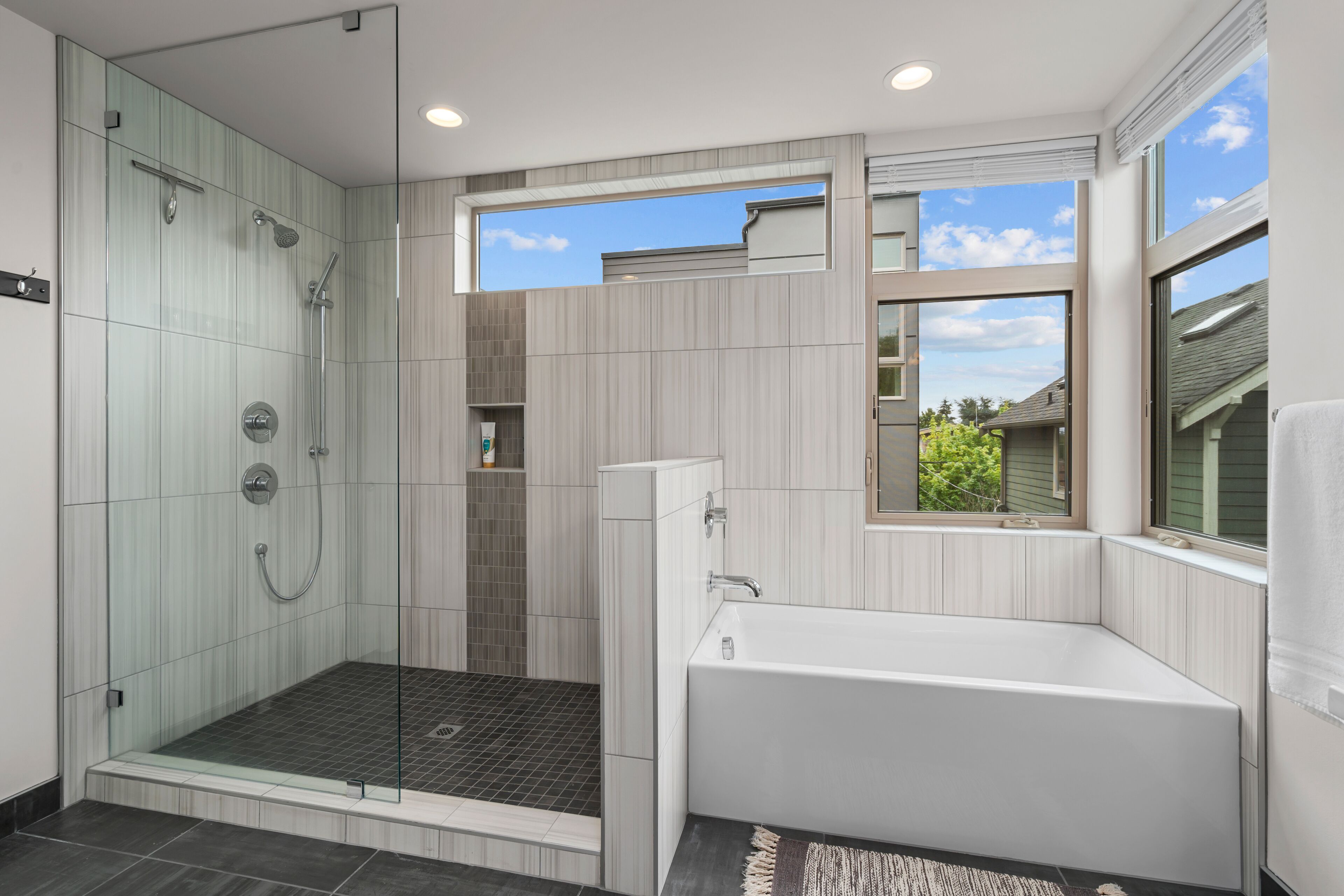 Combined shower/tub, hair dryer, towels, soap