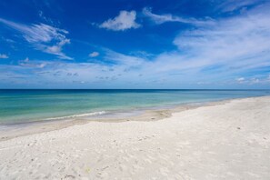 On the beach, sun-loungers, beach towels