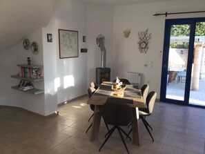 Dining Area  with patio doors leading to the 10X5 metre pool