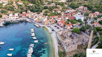 Seasonal outdoor pool, open 9:00 AM to 8:00 PM, pool umbrellas