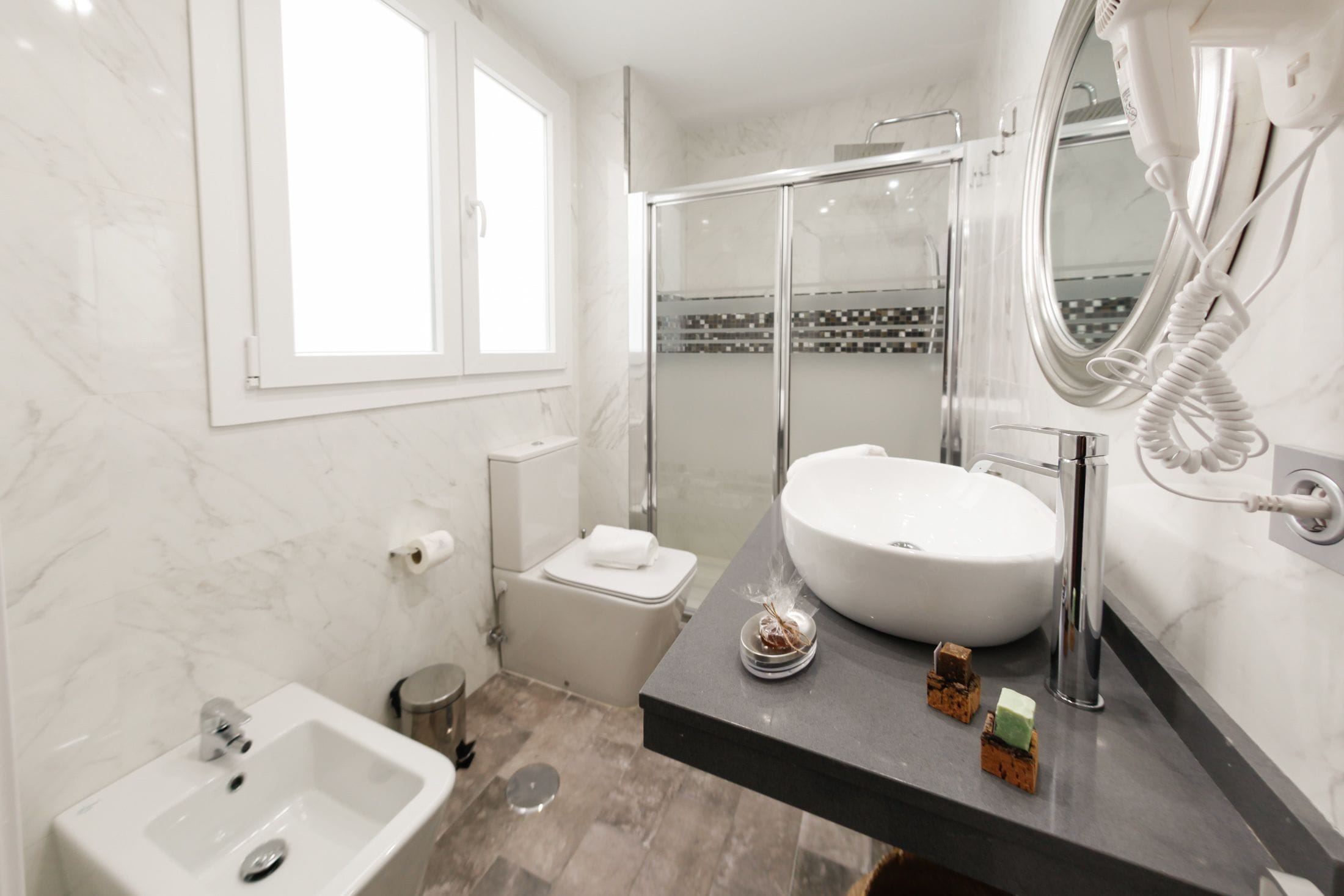 suite, 1 queen bed | bathroom | shower, free toiletries, hair dryer, towels