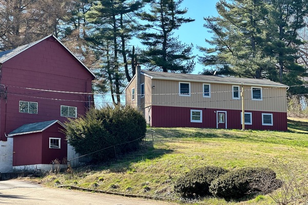 Entrance view of Barn-Chapel and Lodge