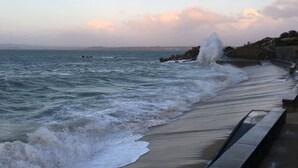 A coastal scene with waves crashing against a stone sea wall. - dZI8, a place like no other ... for a successful holiday! (Douarnenez)