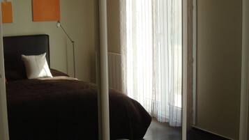 1 chambre, fer et planche Ă repasser, Wi-Fi gratuit, draps fournis