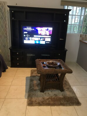 Romantic Apartment, Partial Sea View | Living area | Flat-screen TV - Rose View Apartment Montego Bay (Montego Bay)