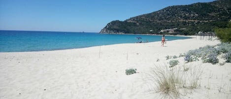 On the beach, sun loungers