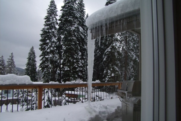 Stay cozy inside and watch it snow.