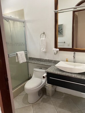 Shower, hair dryer, towels, soap