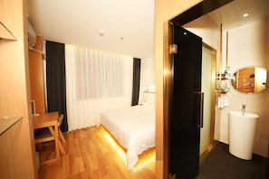 Desk, blackout curtains, free WiFi, bed sheets