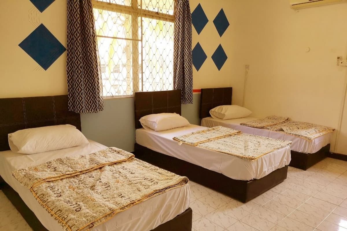 Desk, blackout drapes, iron/ironing board, rollaway beds