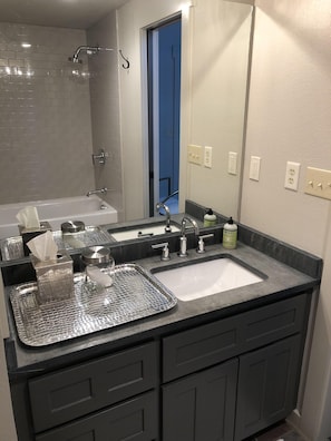 Hair dryer, towels, soap, shampoo