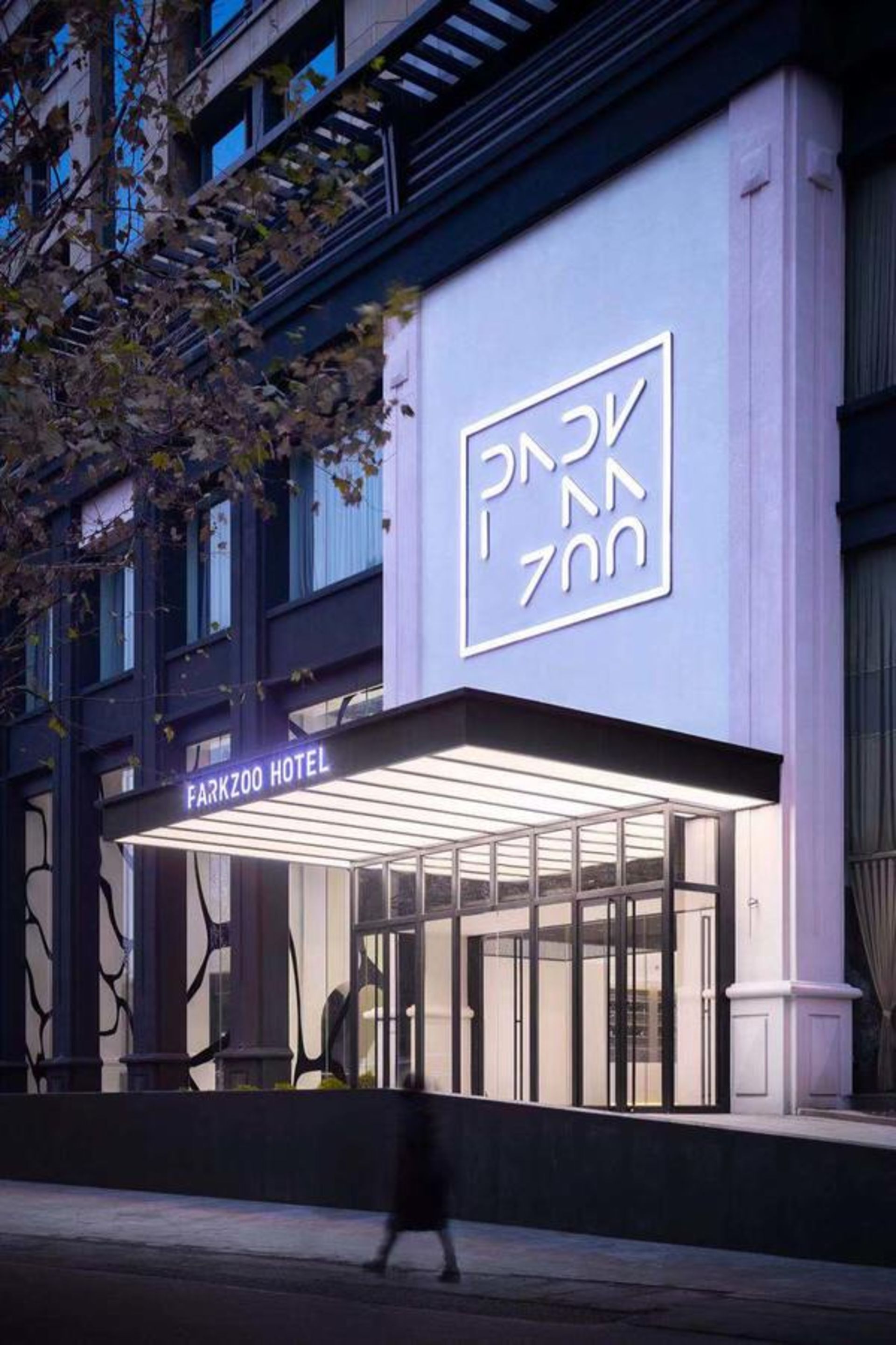 The exterior of the Farkzoo Hotel with a modern facade and large glass windows.