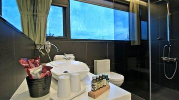Shower, free toiletries, hair dryer, slippers