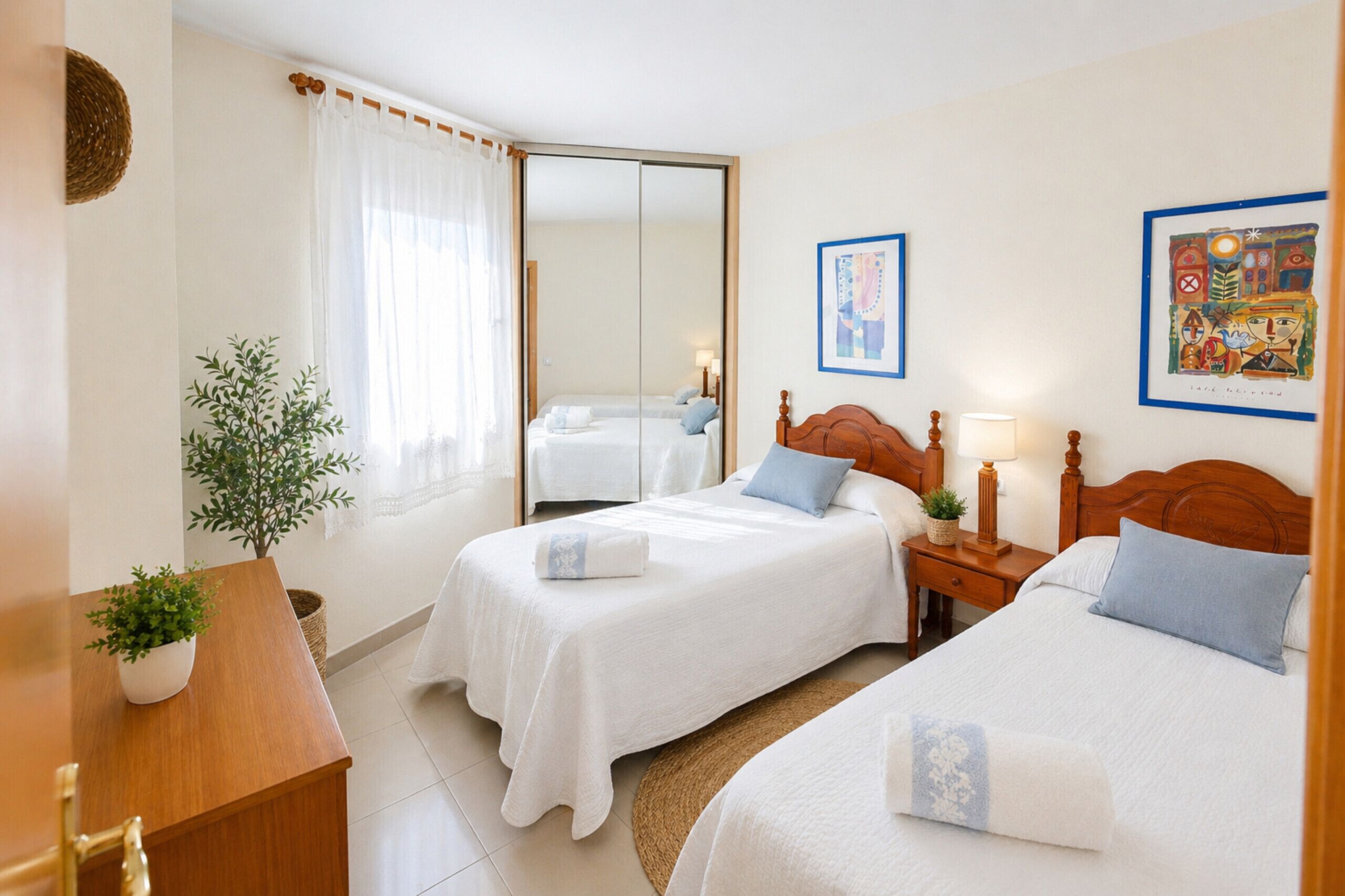 2 dormitorios, tabla de planchar con plancha, wifi gratis y ropa de cama