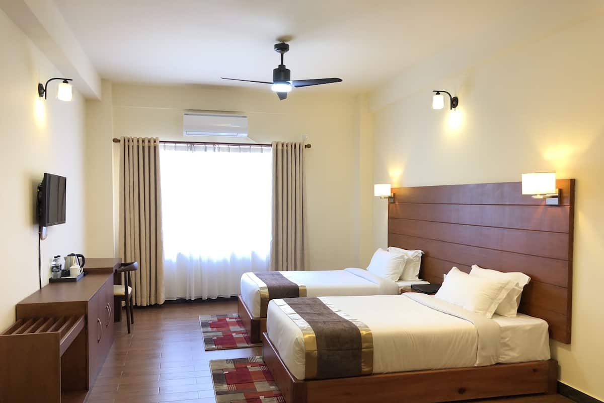Deluxe Double or Twin Room, 2 Double Beds, Mountain View | In-room safe, individually furnished, desk, blackout drapes