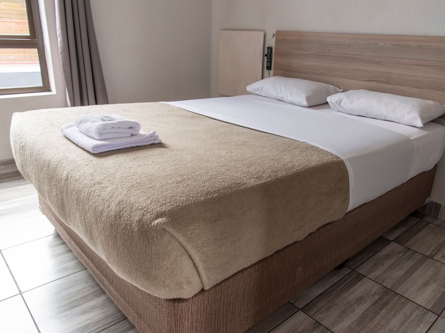 Quarto standard | Área de estar | TV de tela plana