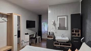 Desk, free WiFi, bed sheets