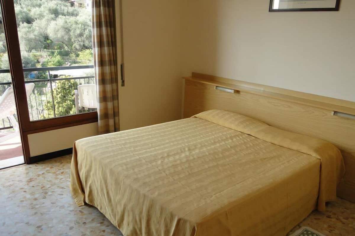 Appartamento, 1 camera da letto, balcone, vista mare | Ferro/asse da stiro, Wi-Fi gratuito, lenzuola