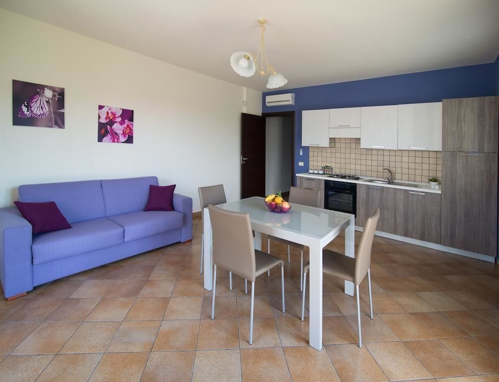 Apartment, 1 Bedroom | Living area | Flat-screen TV