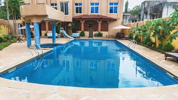 Outdoor pool, pool umbrellas, pool loungers