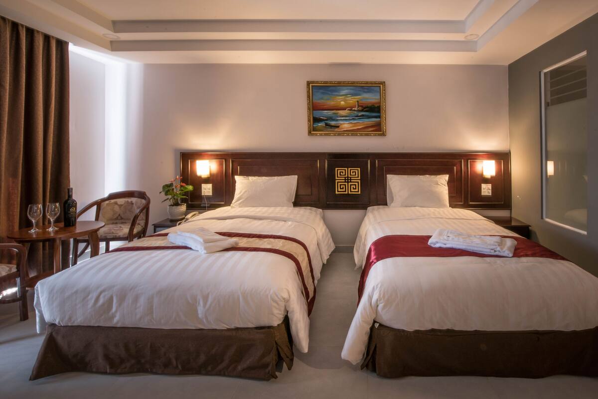 Standard Twin Room, City View | In-room safe, desk, blackout curtains, rollaway beds