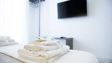 Laptop workspace, blackout curtains, soundproofing, iron/ironing board