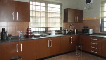 Executive Apartment, 3 Bedrooms | Private kitchen | Full-sized fridge, microwave, oven, stovetop