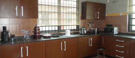 Executive Apartment, 3 Bedrooms | Private kitchen | Full-sized fridge, microwave, oven, stovetop