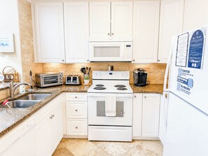 Fridge, microwave, oven, stovetop - Experience Tilghman Beach and Racquet Club Unit 309! 3 Bedroom Ocean View Condo. Pools, Tennis, Close to Main Street! (North Myrtle Beach)
