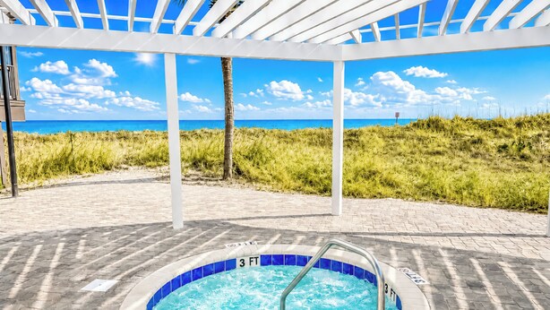 A hot tub with a view of the beach and ocean. - Experience Tilghman Beach and Racquet Club Unit 309! 3 Bedroom Ocean View Condo. Pools, Tennis, Close to Main Street! (North Myrtle Beach)
