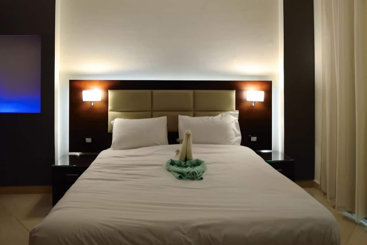 Royal Suite, 2 Bedrooms, Sea View (Second Floor) | Living area | 43-inch LED TV with satellite channels, TV