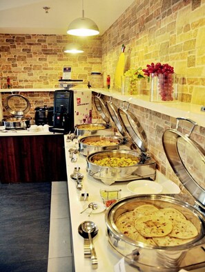 Daily buffet breakfast (INR 250 per person)
