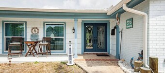 Private bedroom and private bath at separate end of home with water views.