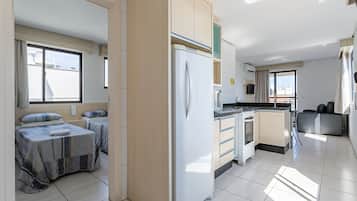Standard Apartment, Multiple Beds | Private kitchen | Fridge, microwave, cookware/dishes/utensils