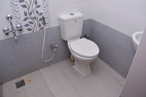 Regadera y toallas