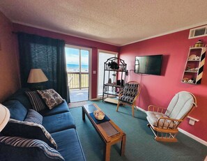 Flat-screen TV - Experience Tilghman Beach and Racquet Club Unit 122! Oceanfront, Pools, Tennis, Close to Main Street! (North Myrtle Beach)