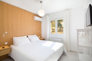Apartment, 1 Bedroom, Sea View | 1 bedroom, premium bedding, in-room safe, iron/ironing board
