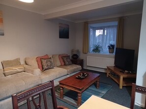 Maison Deluxe, salle de bains privée, vue parc (Spacious 4 Bedroom) | Coin séjour