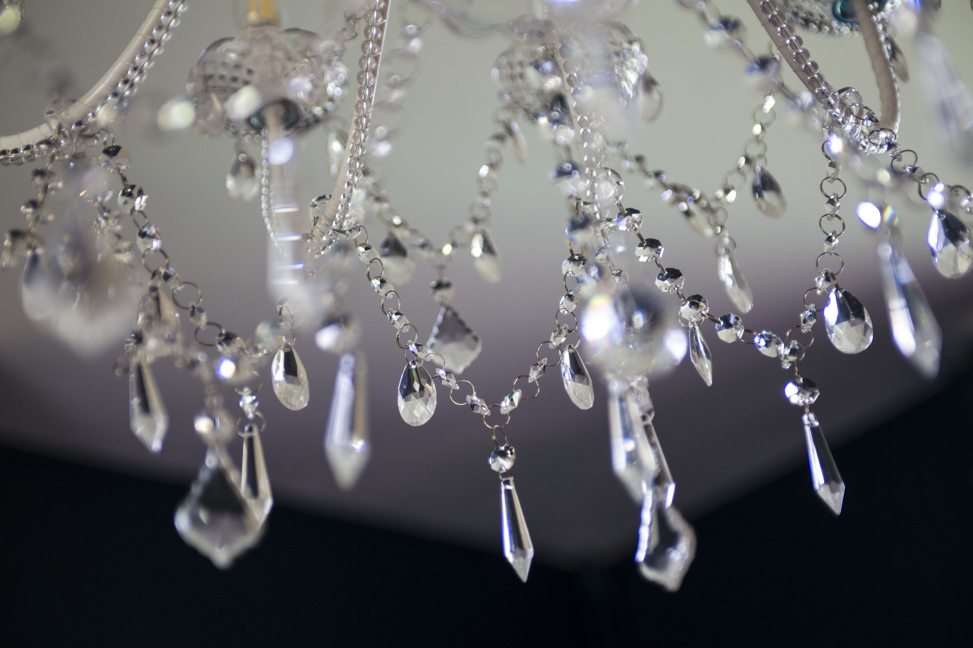 A chandelier with multiple hanging crystal elements.