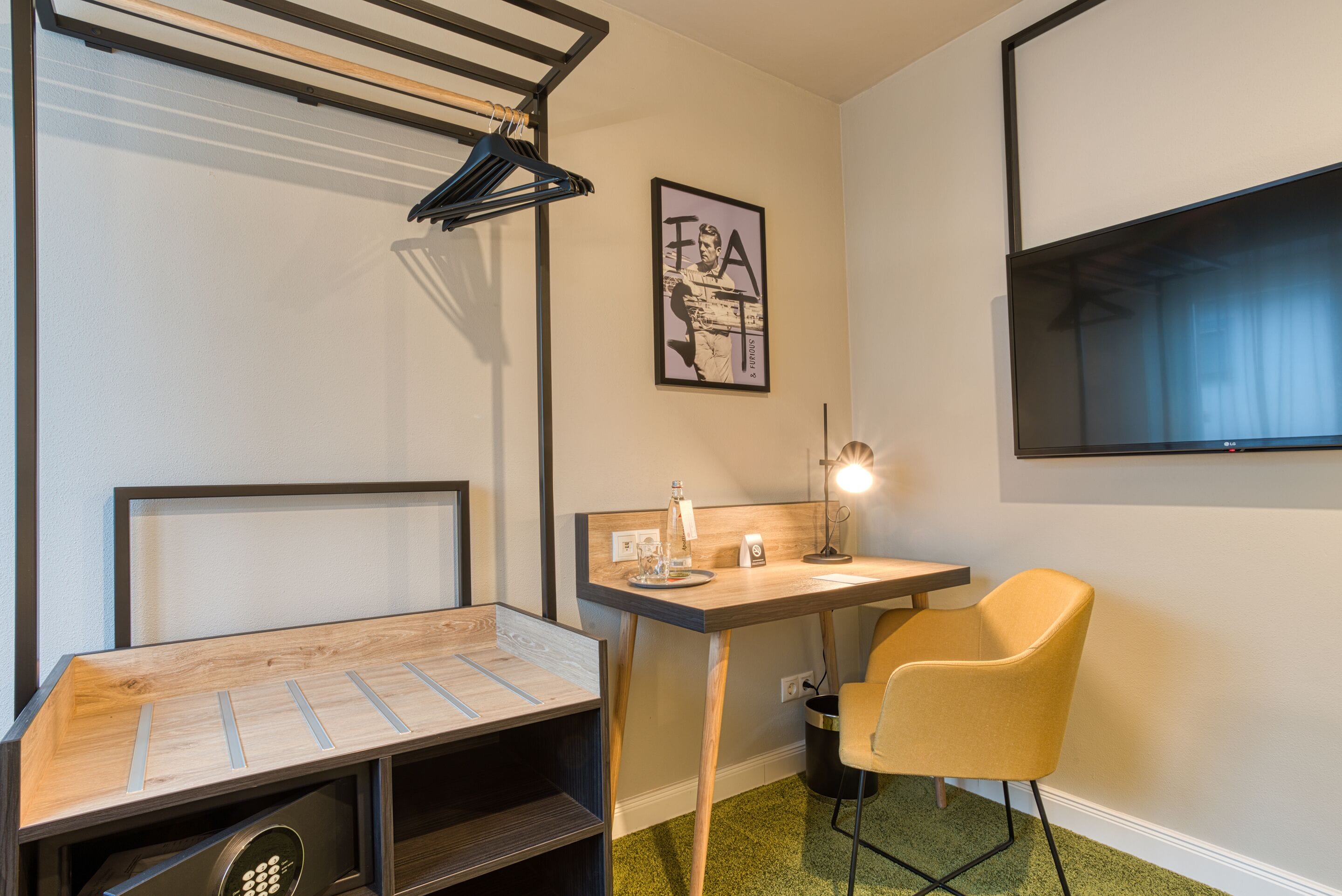 boutique single room | living area | 43-inch tv with satellite channels