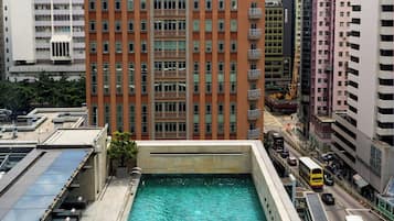 Outdoor pool, open 7:00 AM to 10:00 PM, pool loungers