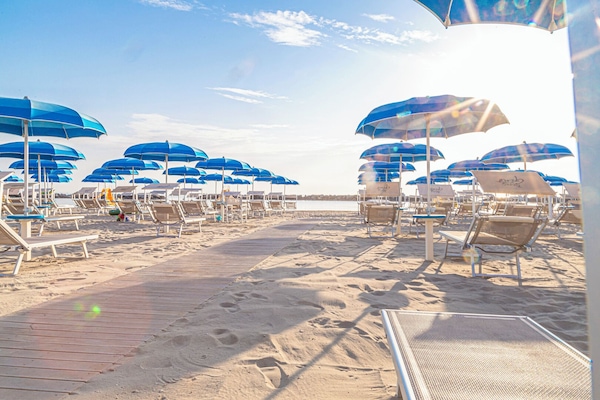 Private beach nearby, 2 beach bars