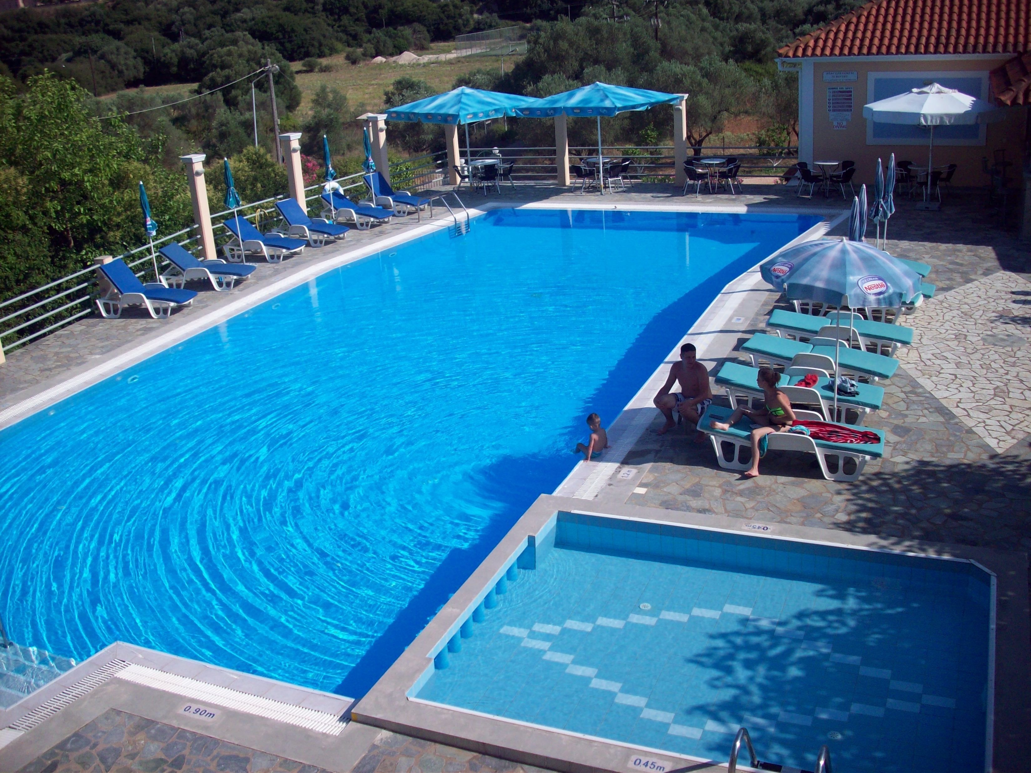 seasonal outdoor pool, pool loungers