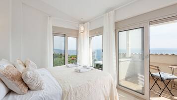 Premium bedding, blackout curtains, soundproofing, iron/ironing board