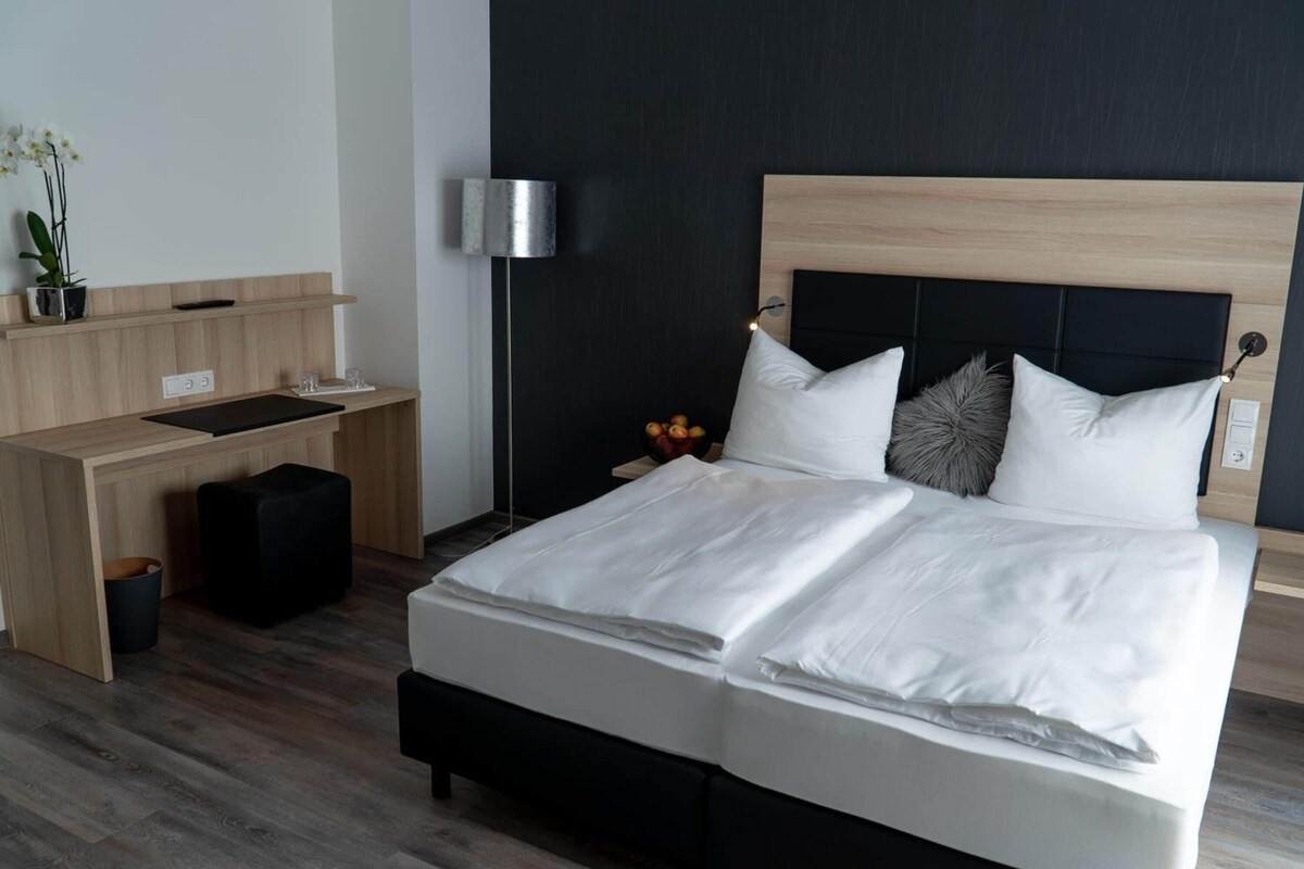 Hypo-allergenic bedding available, desk, laptop workspace, soundproofing