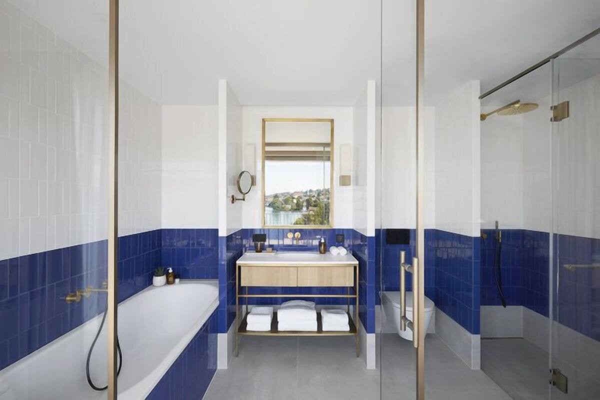 penthouse one bedroom suite | bathroom | shower, free toiletries, hair dryer, bathrobes