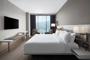 Suite, 1 King Bed with Sofa bed | Hypo-allergenic bedding, in-room safe, individually decorated, desk - AC Hotel by Marriott Kingston, Jamaica (Kingston)